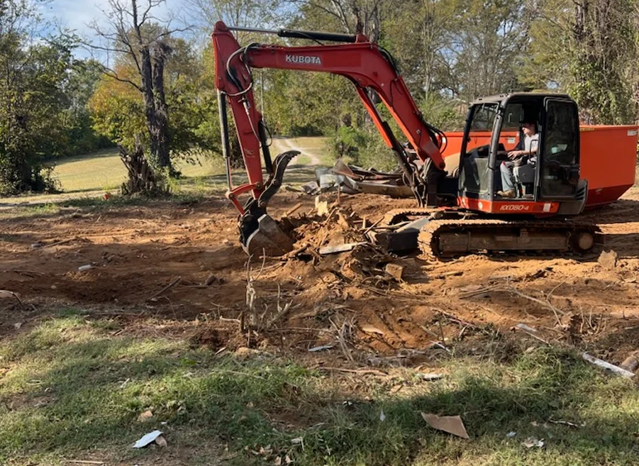 Excavator at Residential Demolition Site